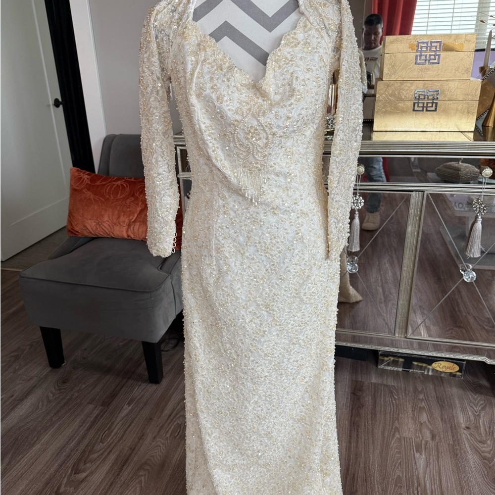 Elegant Cream Long Sleeve Wedding Gown